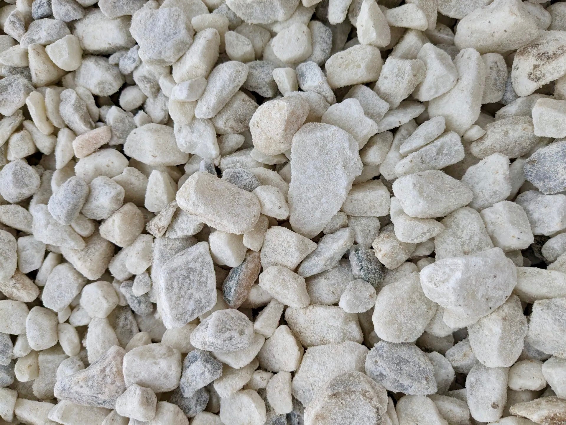 White marble chips decorative landscape rock available for pickup and delivery near Picayune and Covington